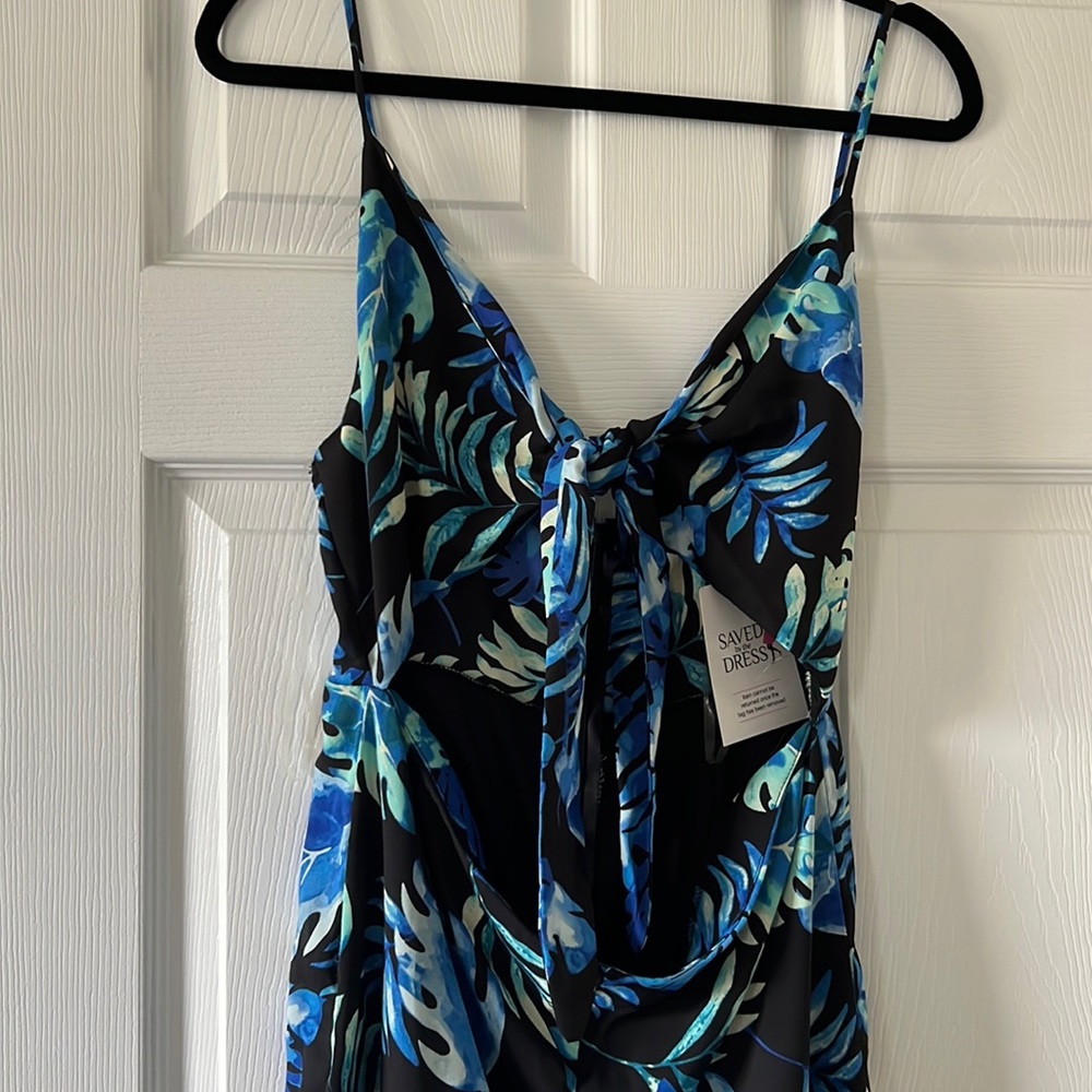 Beautiful tropical romper that has never been worn